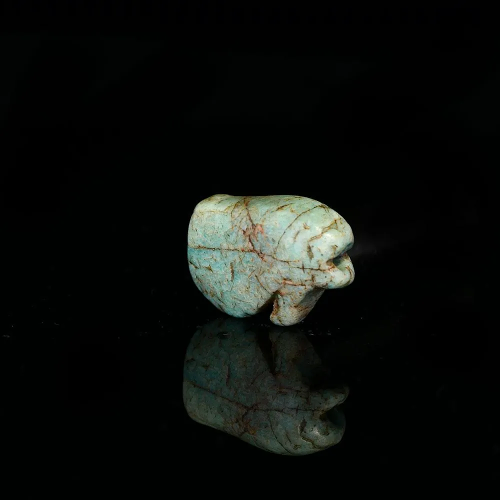 An Egyptian Feldspar Wedjat Eye Amulet, Middle Kingdom, Dynasty 12, ca. 1991 - 1797 BCE