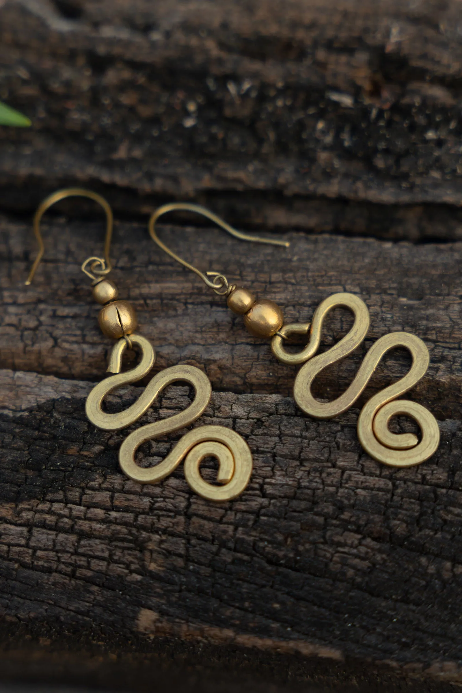 Handmade Dokra Brass Snake Spiral Earrings – Unique Artisan Design for Elegant Style